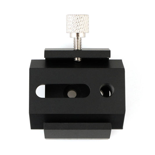 Black metal clamp with a textured white lamp on a white background