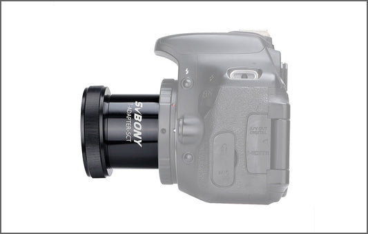 Digital camera with lens attached on a white background