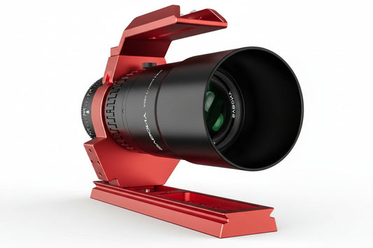 Red camera lens hood with a black lens on a white background