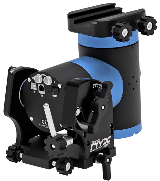 Angled rear view of the Pegasus NYX-101 harmonic mount showing the control panel, ports, and strain-wave drive assembly.
